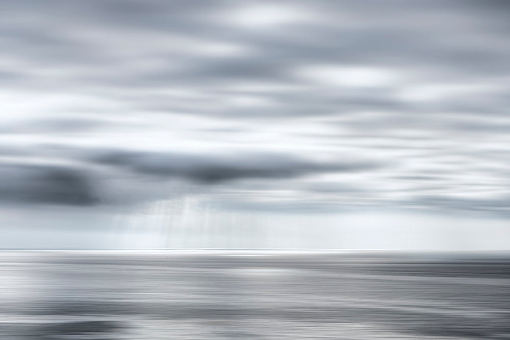 No. 30 - Solace of Light→ Sun breaking through cloud to calm the sea